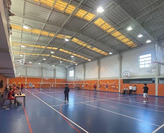 Vista geral do torneio de Badminton no pavilhão